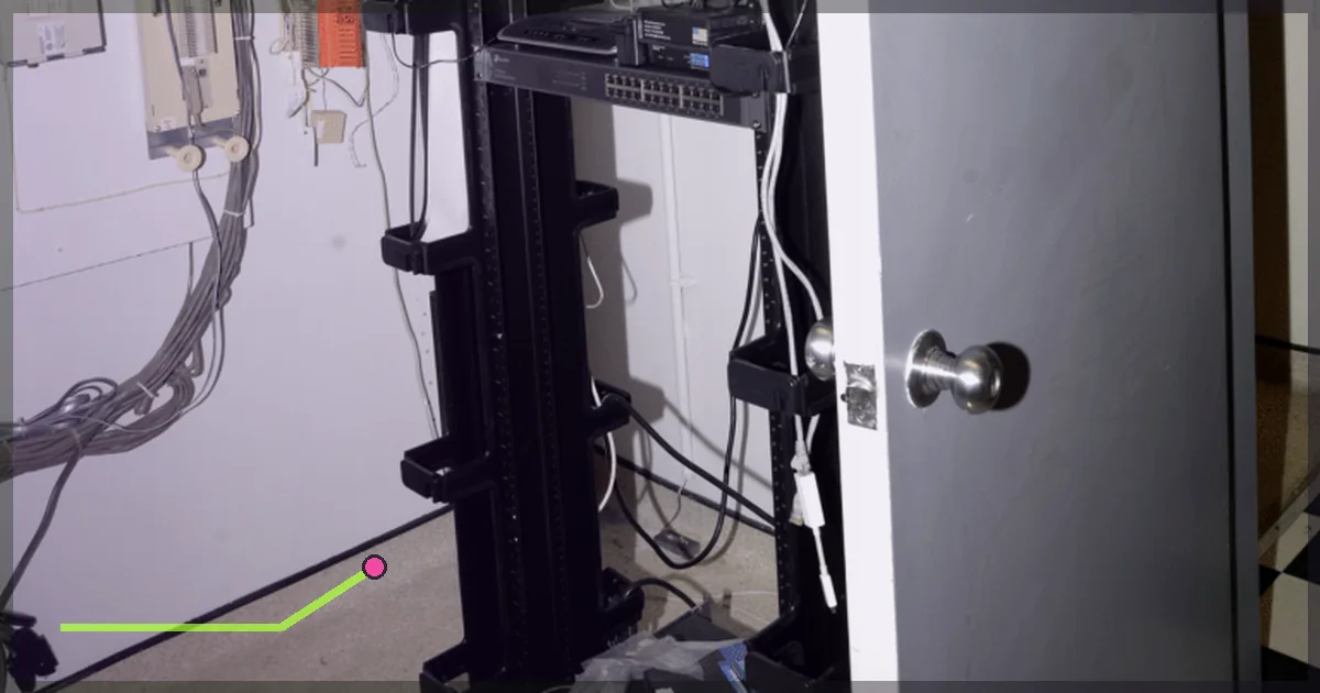 Server room filled with racks, network equipment and connected cables