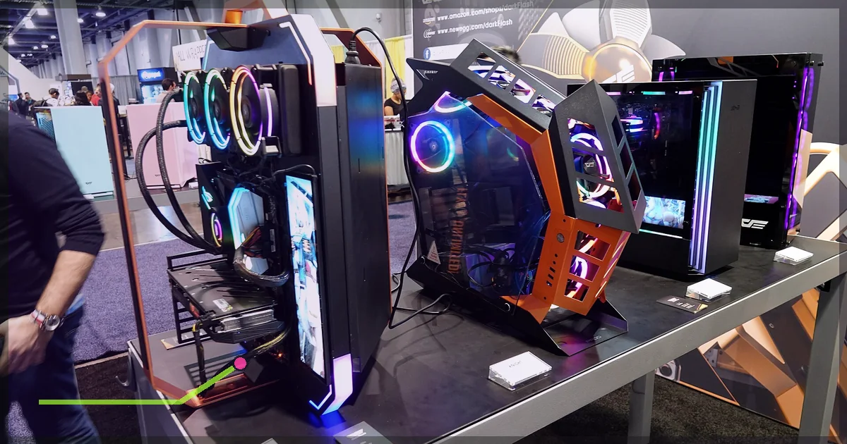 Custom desktop gaming computers displayed at a technology event